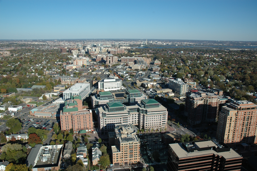 A view looking east along the Rosslyn-Ballston corridor in northern Arlington County; the dense corridor was the product of transit-oriented development efforts along the Orange Line subway through the county.  Photo from the Arlington County government website.